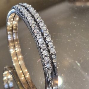 AMS8937 a rare antique Carl Faberge double diamond bangle. POA