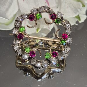 AMS9092 Demantoid garnet ruby and diamond brooch, circa 1910