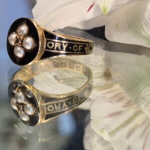 AMS9106 Enamel and seed pearl mourning ring, London 1875
